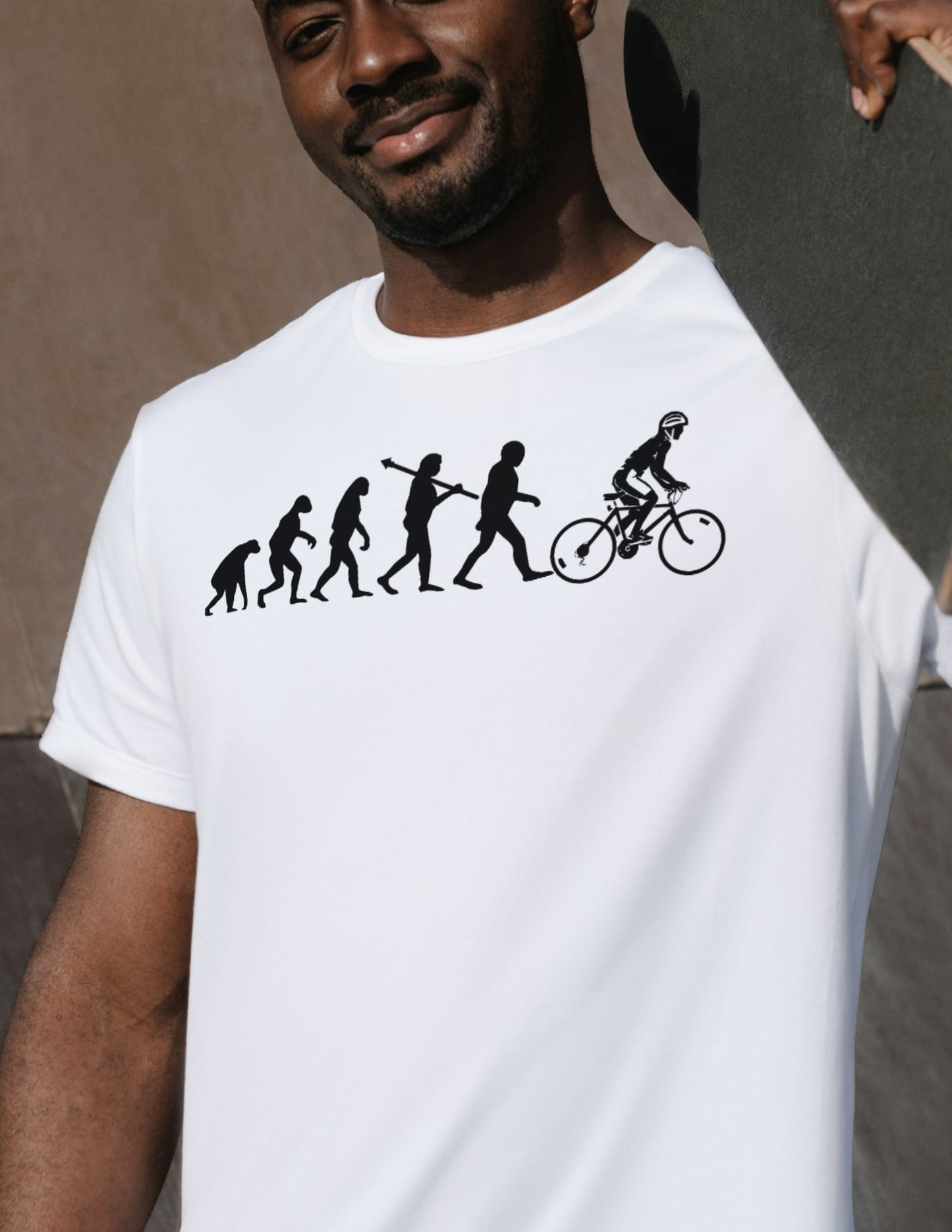 White t-shirt with black evolution silhouette ending in a cyclist.