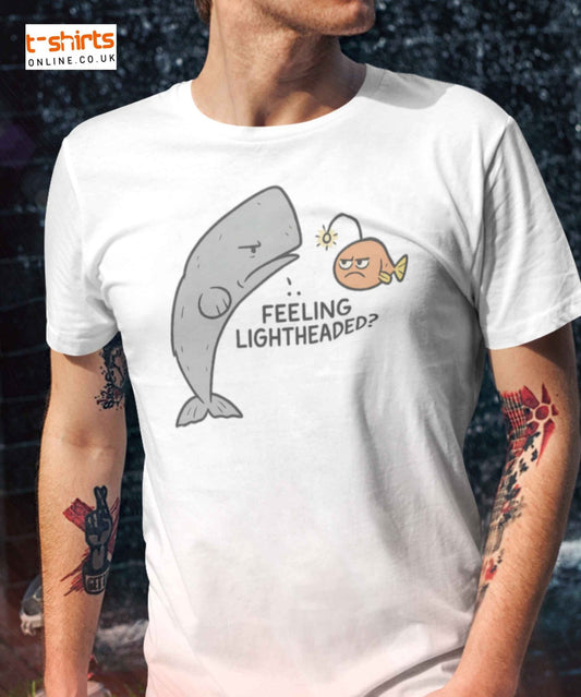 A cartoon whale asks a glowing anglerfish, “Feeling lightheaded?” with a sarcastic tone.