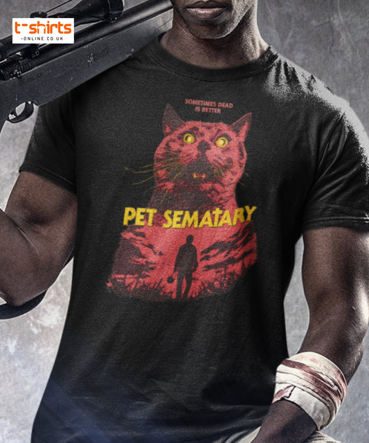 Person wearing a 'Pet Sematary' t-shirt with a red cat graphic and text.