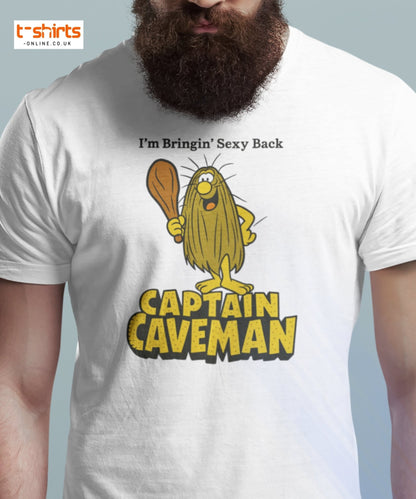 White t-shirt with Captain Caveman graphic and text on a light gray background