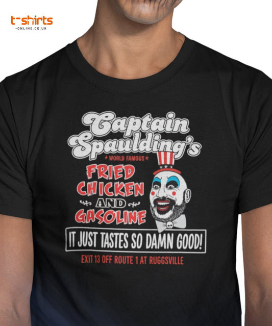 Black t-shirt with a graphic design featuring text and a clown face, worn by a person.