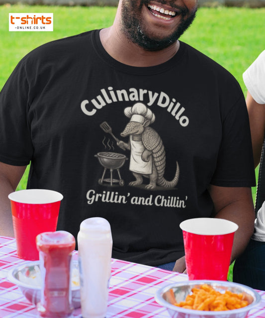 Man wearing a black t-shirt with 'CulinaryDillo' design at a picnic table.