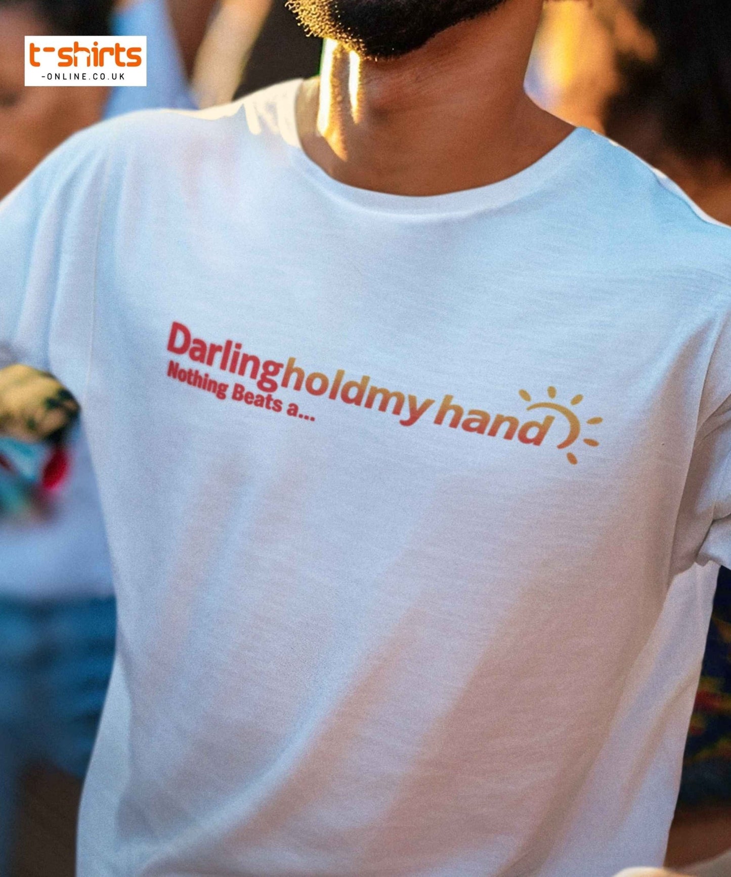 White t-shirt with text and graphics worn by a person, with 't-shirts-online.co.uk' branding.