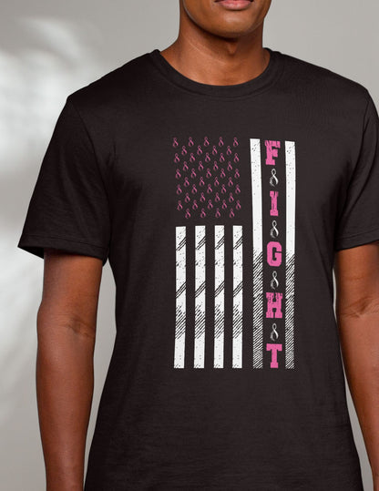 Man wearing a black T-shirt with an American flag and pink ribbons spelling out “FIGHT” in support of cancer awareness.