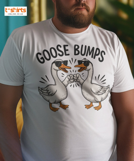 Person wearing a white t-shirt with 'GOOSE BUMPS' graphic design featuring two cartoon geese.