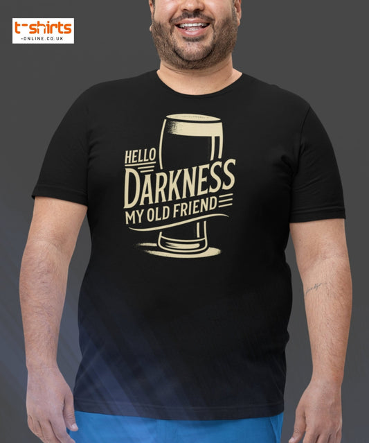 Person wearing a black t-shirt with a graphic and text on a gray background