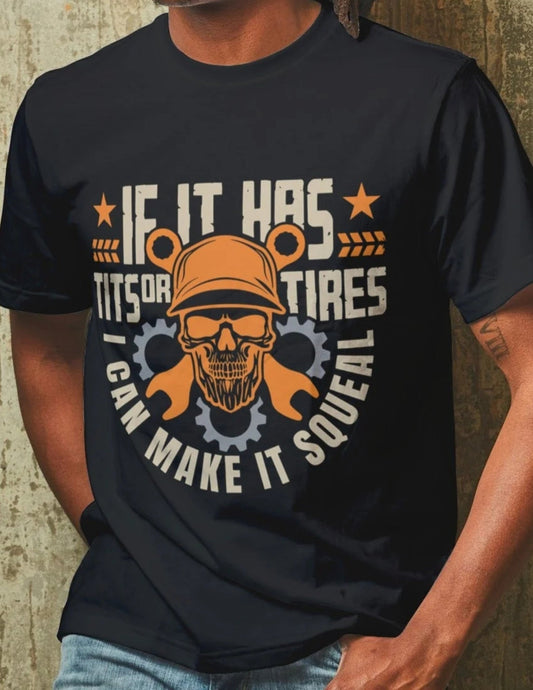 Man wearing a black t-shirt with a skull-and-wrench design and the bold text “If It Has Tits or Tires I Can Make It Squeal.”