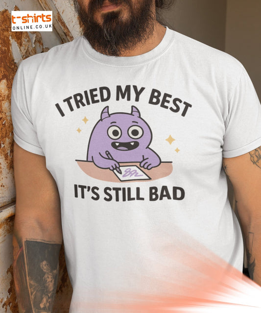 Man wearing a white “I Tried My Best” funny t-shirt with a cute purple cartoon monster.