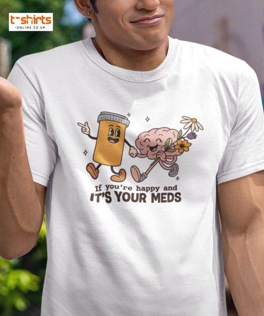 Person wearing a white t-shirt with a cartoon design and text.