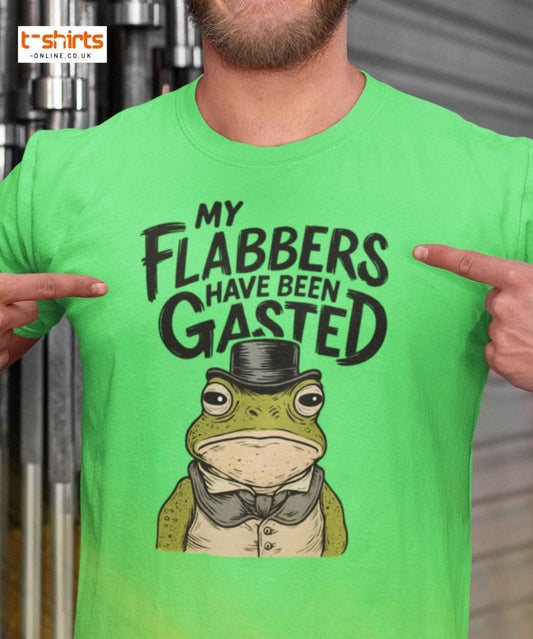 Green t-shirt with a frog graphic and text, worn by a person.
