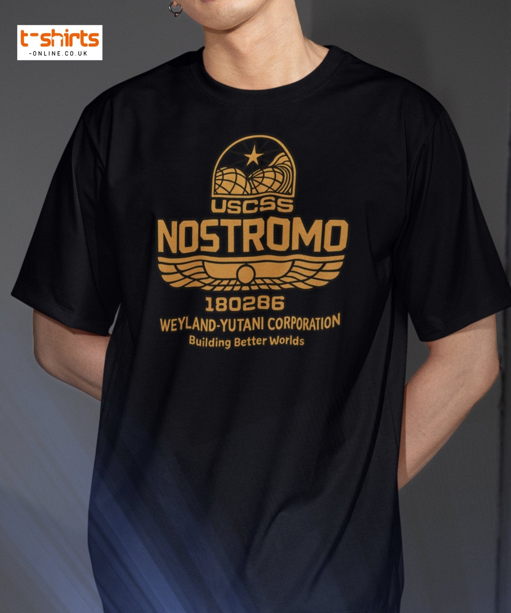 Black t-shirt with gold 'Nostromo' logo worn by a person against a gradient background