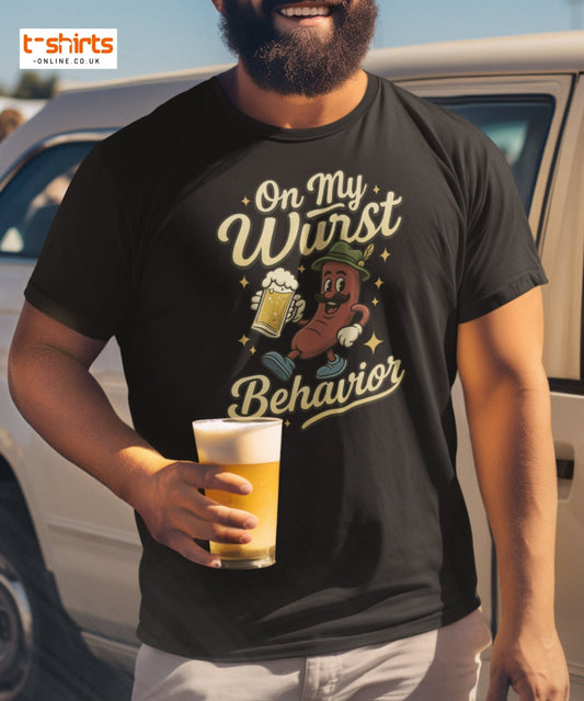 Man wearing a black t-shirt with a graphic design and holding a beer, standing next to a car.