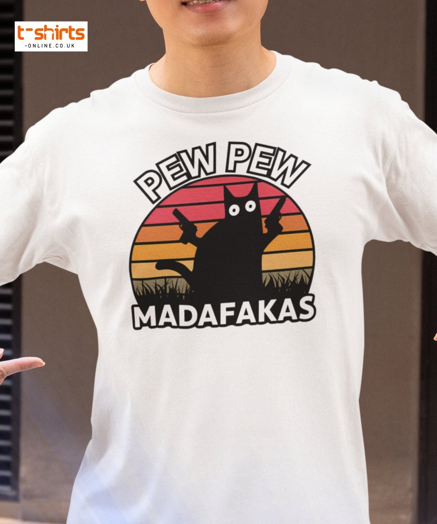 Person wearing a white t-shirt with a graphic design and text.