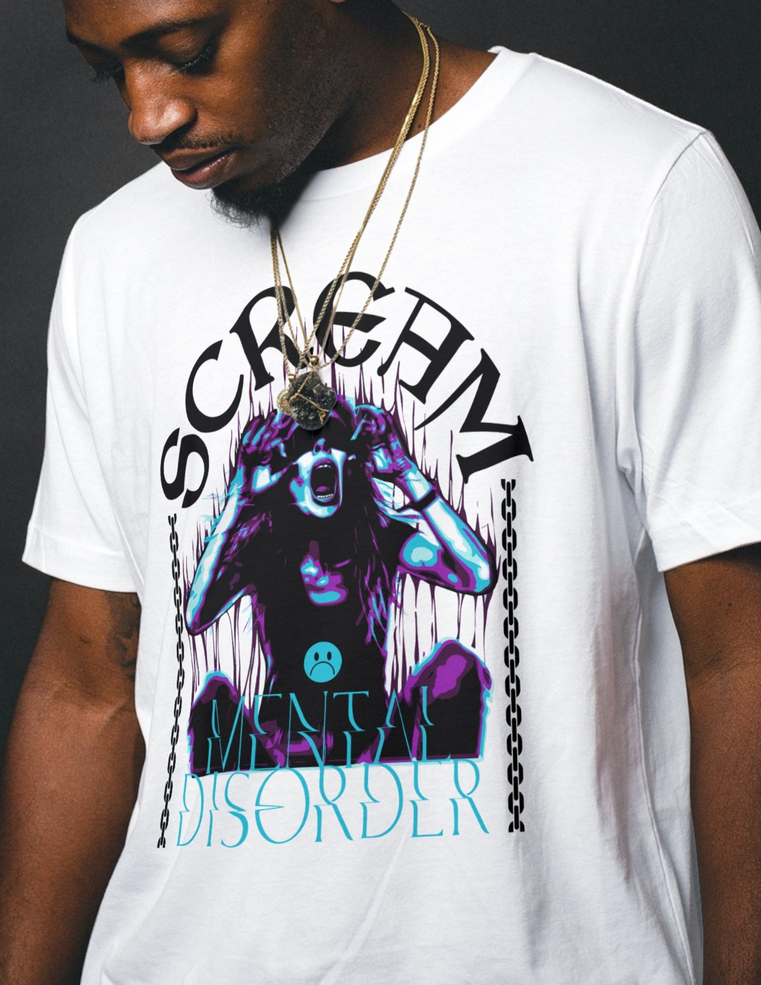 White t-shirt with intense blue and purple artwork of a screaming figure, reading “Scream – Mental Disorder.”