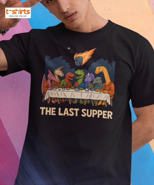 Person wearing a black t-shirt with 'The Last Supper' graphic featuring dinosaurs.