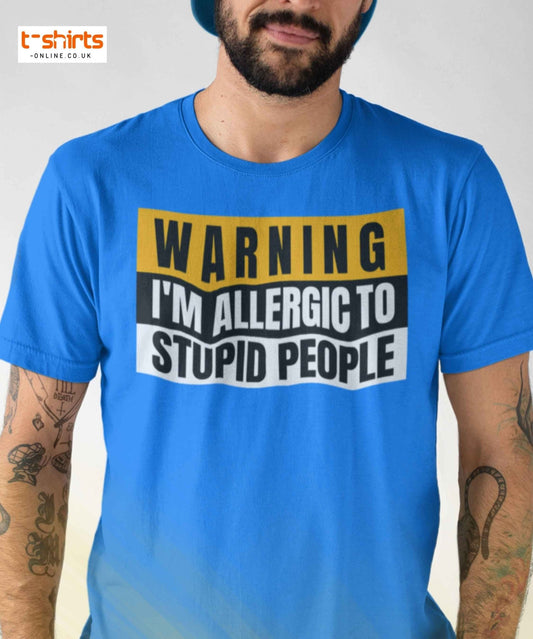 Man wearing a blue t-shirt with a humorous text design on a plain background