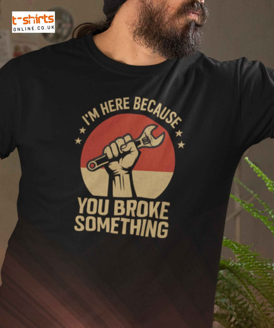 Stencil-style hand holding wrench with text "I'm Here Because You Broke Something" in retro colors